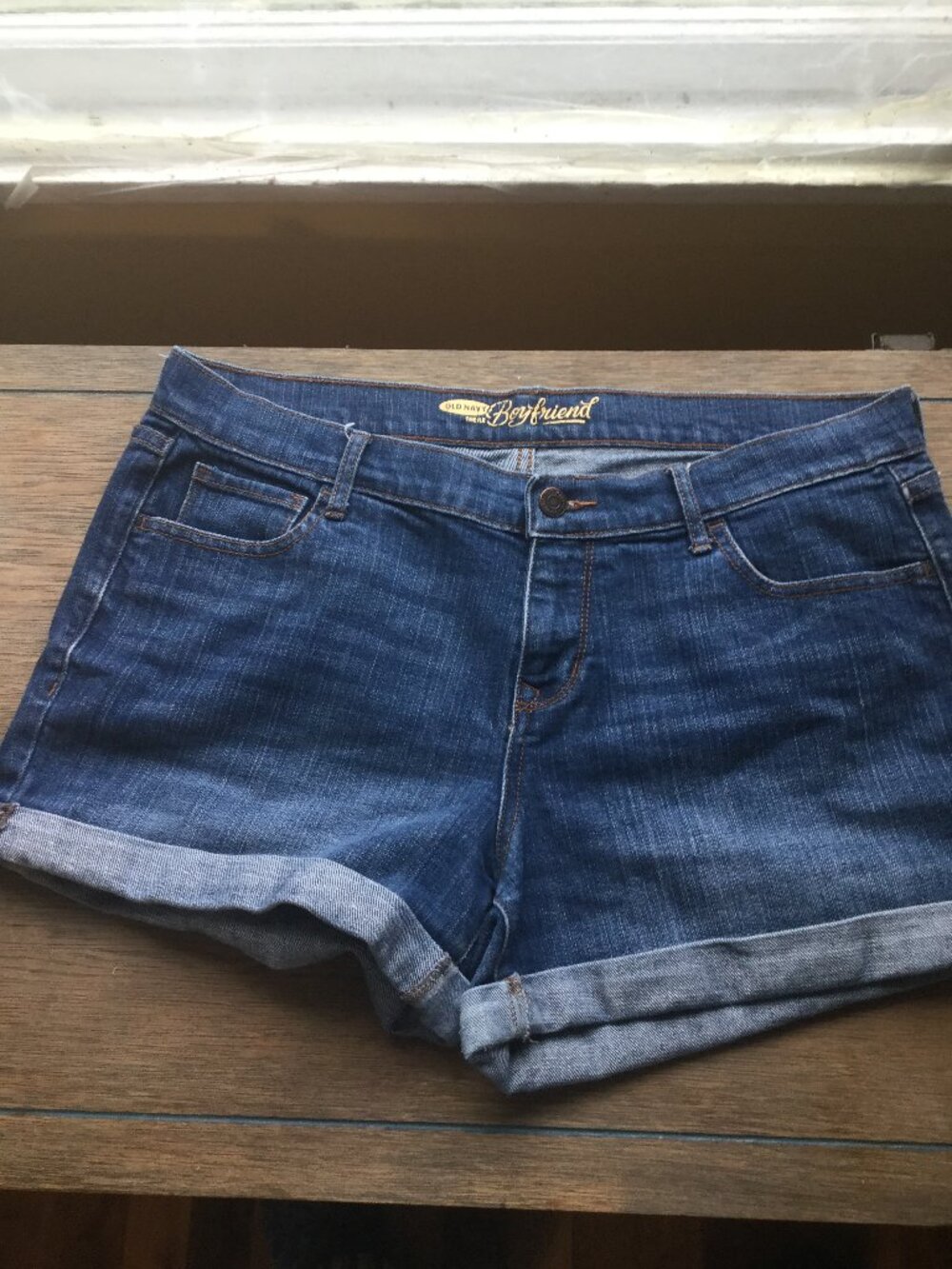 Old Navy  denim shorts Boyfriend style size 10 waist  is 17 across and inseam 3"